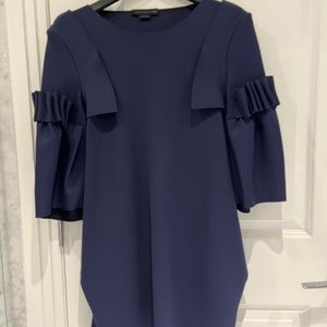 Dress by leading Montreal fashion designer Marie Saint Pierre.